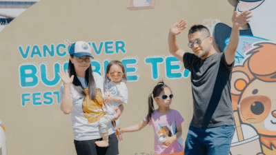 A family enjoying drinks and games at the 2025 Canada Bubble Tea Festival in Burnaby.