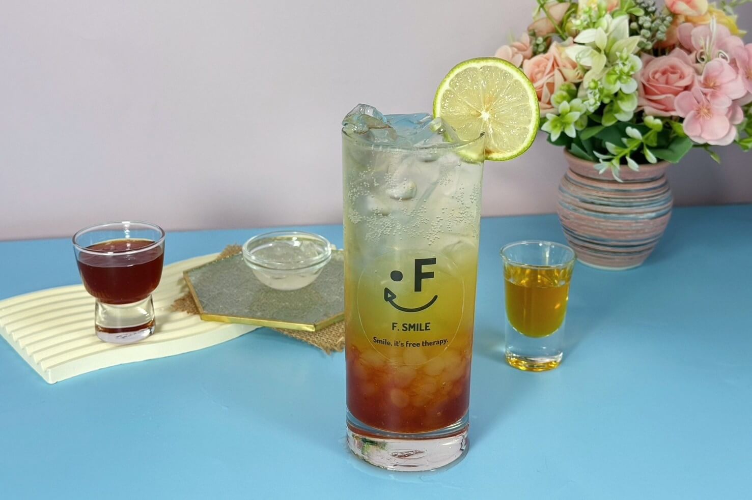 Grapefruit bubble tea with crystal boba and lemon slice