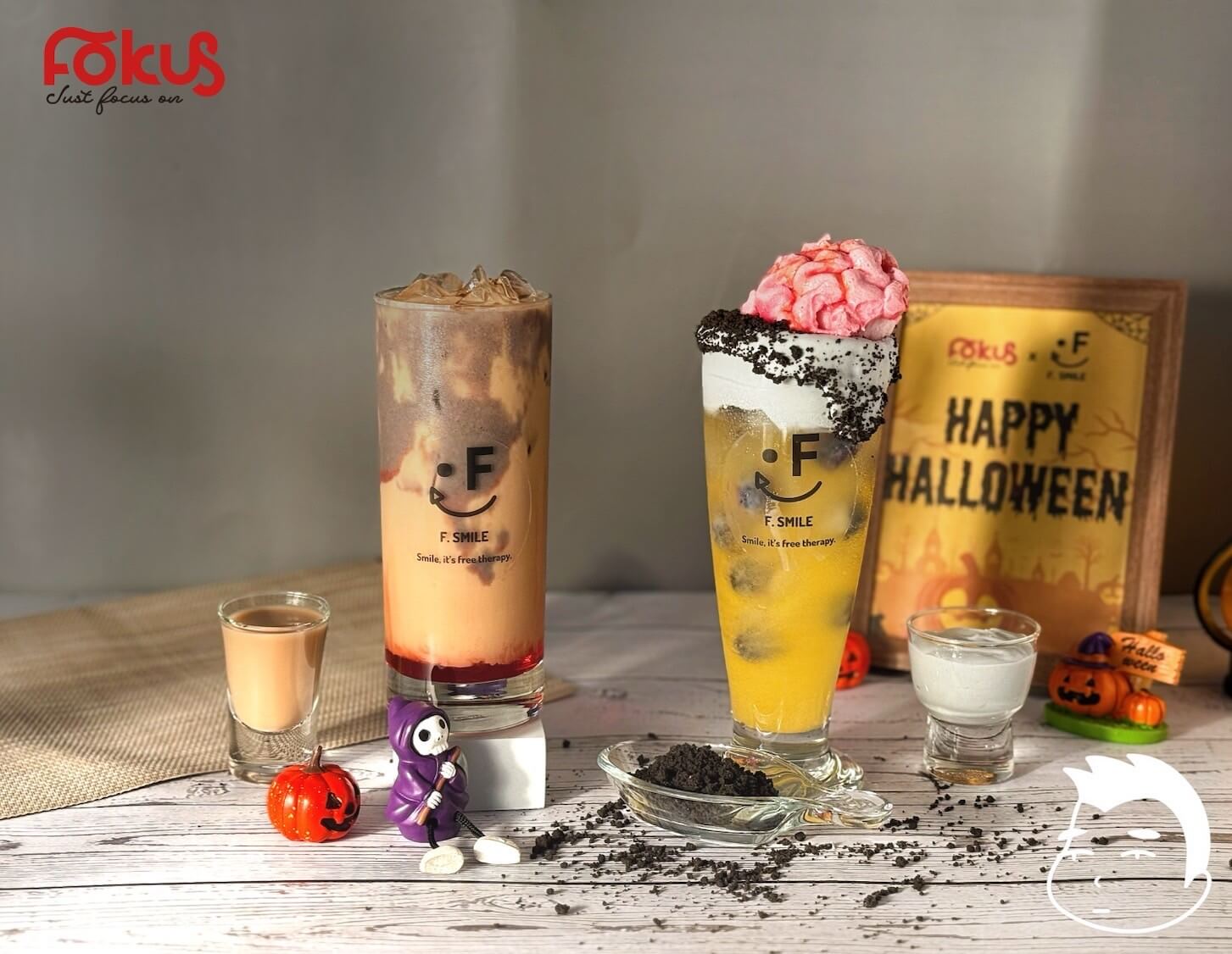 Halloween bubble tea with spooky colors and themed toppings