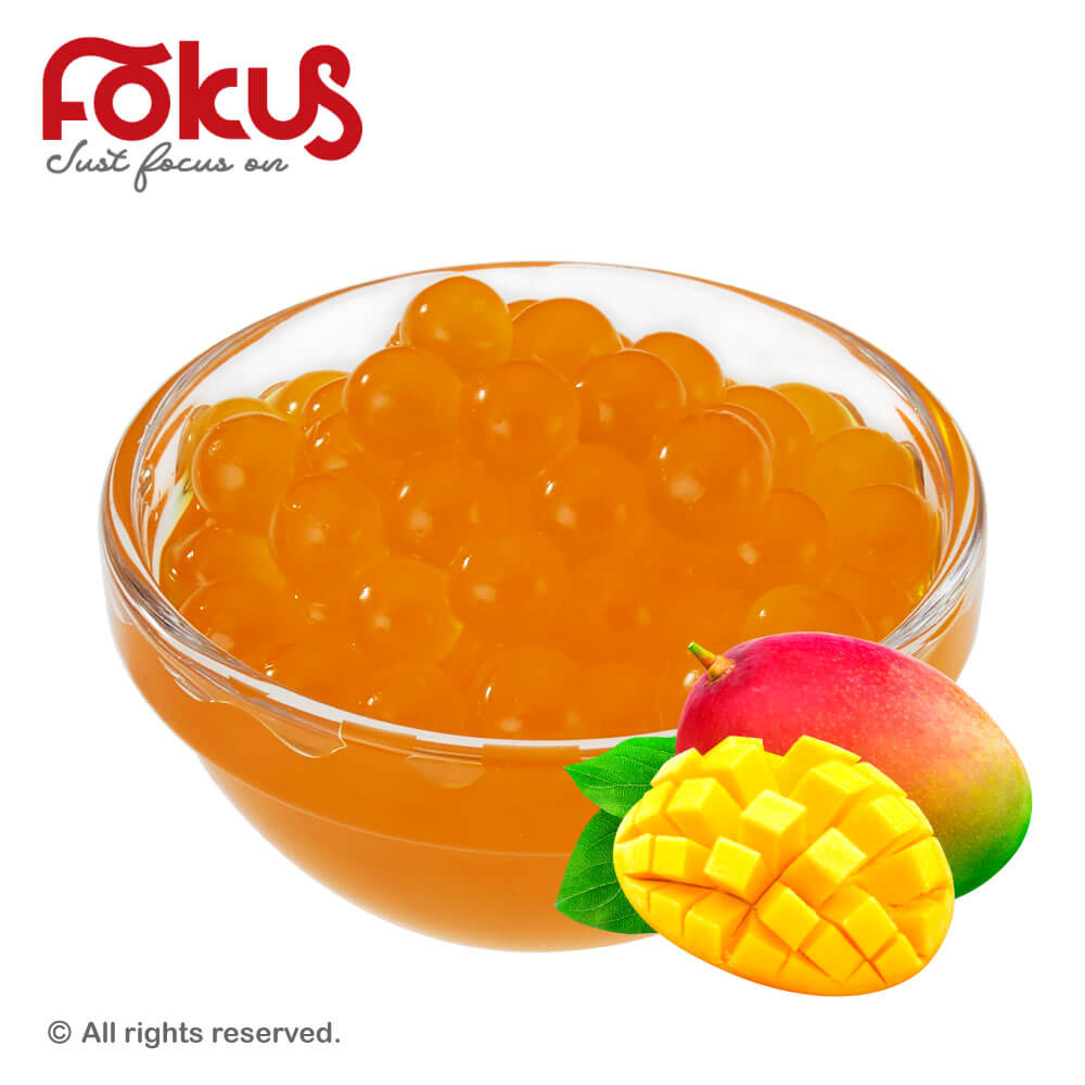 Mango popping boba pearls bursting with tropical flavor, perfect for bubble tea and desserts