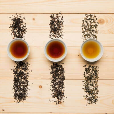 Premium loose tea leaves including black tea, green tea, and oolong – customizable for rich, aromatic bubble tea bases